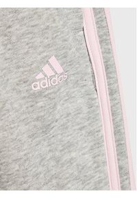 Adidas - adidas Spodnie dresowe 3-Stripes HM8759 Szary Slim Fit. Kolor: szary. Materiał: syntetyk