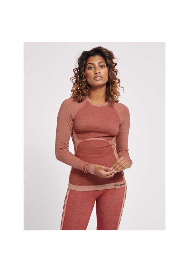 Damska koszulka z długim rękawem Hummel Clea. Kolor: czerwony, fioletowy, wielokolorowy, różowy. Długość rękawa: długi rękaw. Długość: długie. Sport: piłka ręczna