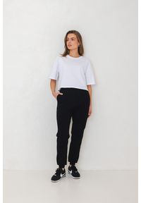 SPODNIE CELINE CZARNE M - Flawless. Kolor: czarny. Materiał: elastan, skóra, bawełna, guma, dresówka