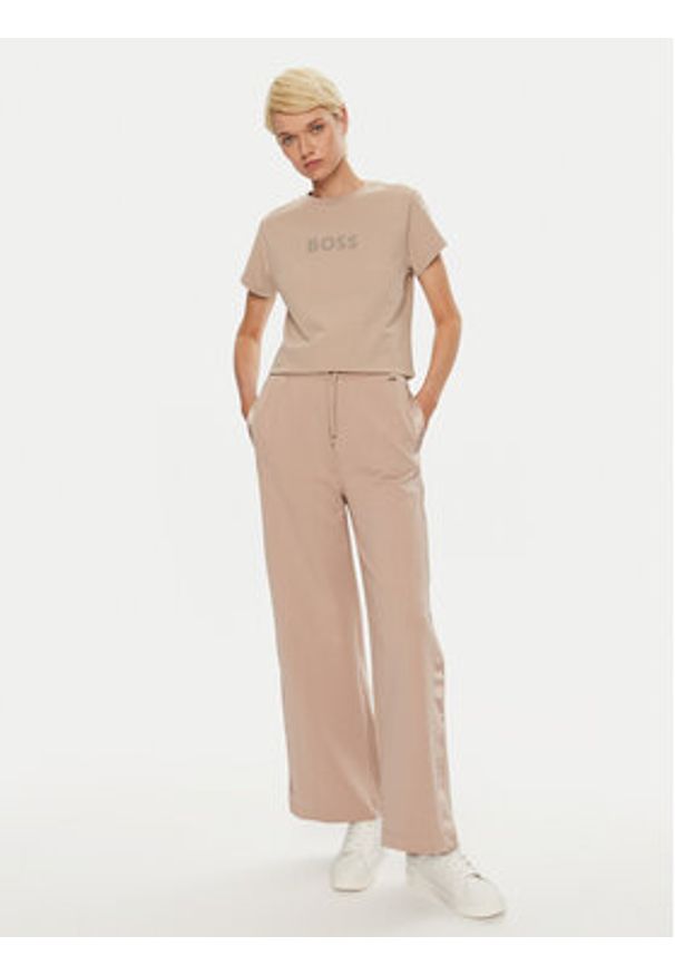 BOSS - Boss Spodnie dresowe 50527302 Beżowy Regular Fit. Kolor: beżowy. Materiał: bawełna