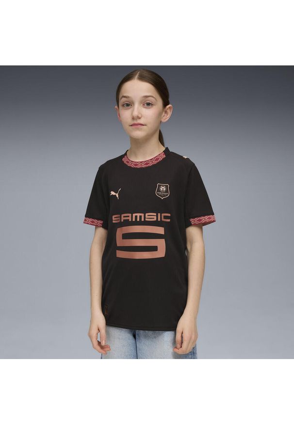 Puma - Młodzieżowa trzecia koszulka Stade Rennais F.C. 25/26 PUMA Black Copper Metallic. Kolor: czarny, szary, wielokolorowy. Sport: piłka nożna