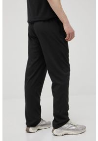 Reebok spodnie FP9167 męskie kolor czarny. Kolor: czarny. Materiał: tkanina #3