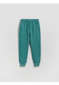Reserved - Bawełniane joggery - morski. Kolor: morski. Materiał: bawełna #1