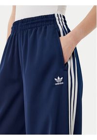 Adidas - adidas Spodnie dresowe adicolor Satin JD0881 Granatowy Wide Leg. Kolor: niebieski. Materiał: syntetyk #5