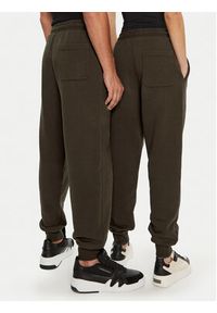 AMI PARIS - AMI Paris Spodnie dresowe UTR240.JE0091 Brązowy Regular Fit. Kolor: brązowy. Materiał: bawełna #5