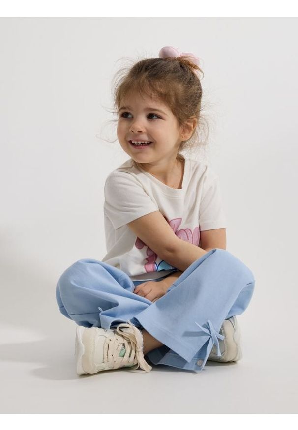 Reserved - Spodnie z kokardkami - jasnoniebieski. Kolor: niebieski. Materiał: bawełna