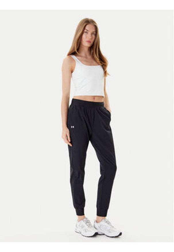Under Armour Spodnie dresowe Armoursport High Rise Wvn Pnt 1382727-001 Czarny Loose Fit. Kolor: czarny. Materiał: syntetyk