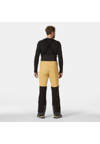 Spodnie narciarskie z szelkami Helly Hansen Odin BC Softshell. Kolor: beżowy, żółty, wielokolorowy. Materiał: softshell. Sezon: zima. Sport: narciarstwo