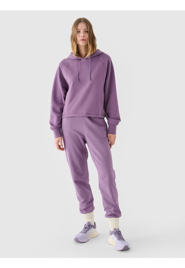 4f - 4F Spodnie dresowe joggery damskie - fioletowe XS. Kolor: fioletowy. Materiał: dresówka. Wzór: gładki, ze splotem