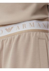 EA7 Emporio Armani Spodnie dresowe 7W000282 AF12501 U6155 Beżowy Loose Fit. Kolor: beżowy. Materiał: syntetyk #3