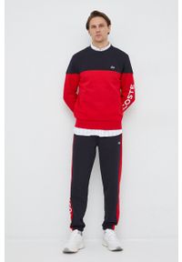 Lacoste spodnie dresowe kolor czerwony wzorzyste. Kolor: czerwony. Materiał: dresówka #5