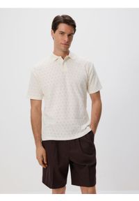 Reserved - Koszulka polo comfort fit - złamana biel. Typ kołnierza: polo. Materiał: bawełna, dzianina