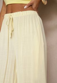 Renee - Jasnożółte Szerokie Spodnie High Waist z Gumką w Talii Ilnena. Stan: podwyższony. Kolor: żółty. Materiał: tkanina. Sezon: lato