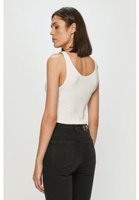 Calvin Klein Jeans - Top. Kolor: biały. Materiał: dzianina, bawełna. Wzór: nadruk