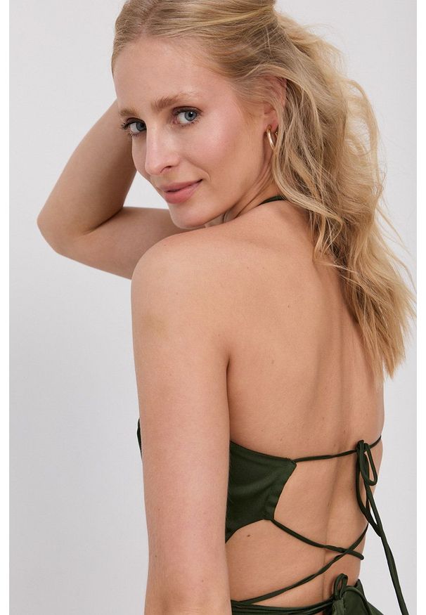 Guess - Kombinezon. Kolor: zielony. Materiał: tkanina. Długość rękawa: na ramiączkach. Wzór: gładki