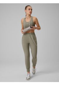 4f - 4F Spodnie treningowe szybkoschnące damskie - oliwkowe S. Kolor: oliwkowy, brązowy, wielokolorowy. Materiał: włókno. Sport: fitness #1