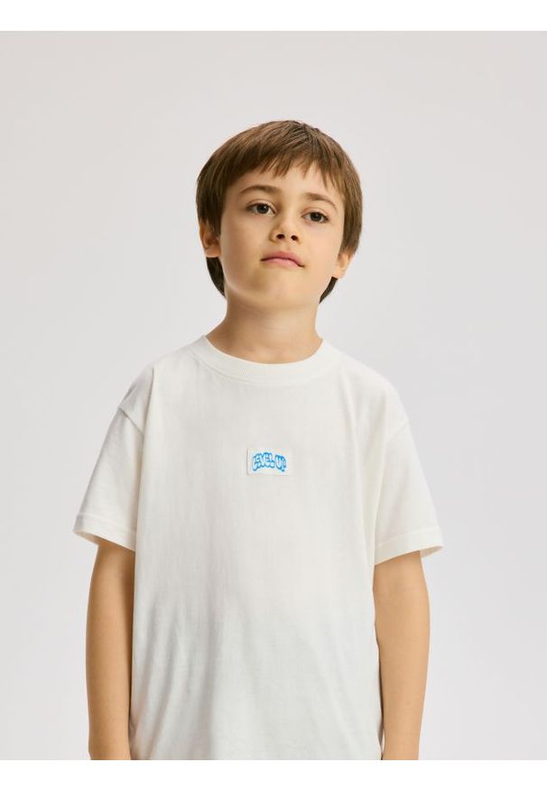 Reserved - Bawełniany t-shirt oversize - złamana biel. Materiał: bawełna