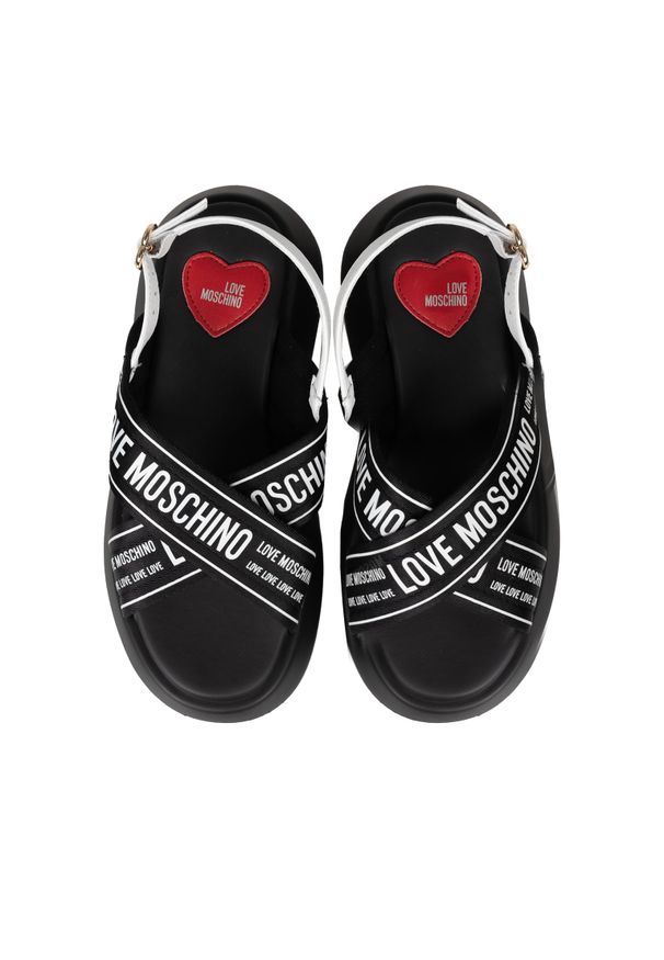 Love Moschino Sandały | JA16257I0IIX6 | Kobieta | Czarny, Biały. Okazja: na spacer, na co dzień. Zapięcie: pasek. Kolor: czarny, biały, wielokolorowy. Materiał: skóra. Wzór: nadruk. Styl: elegancki, casual