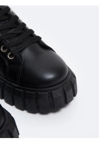 Big-Star - Sneakersy damskie czarne MM274617 906. Okazja: na spacer, na co dzień. Nosek buta: okrągły. Kolor: czarny. Materiał: guma, skóra ekologiczna. Sport: turystyka piesza #4
