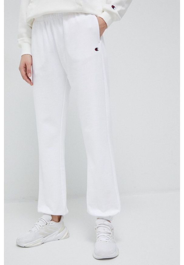 Champion spodnie dresowe kolor biały gładkie. Kolor: biały. Materiał: dresówka. Wzór: gładki