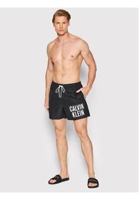 Calvin Klein Swimwear Szorty kąpielowe Medium KM0KM00739 Czarny Regular Fit. Kolor: czarny. Materiał: syntetyk
