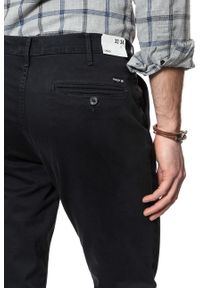 Wrangler - WRANGLER SPODNIE MĘSKIE CHINO DARK NAVY W16LA1XAE 112127300. Materiał: materiał #3