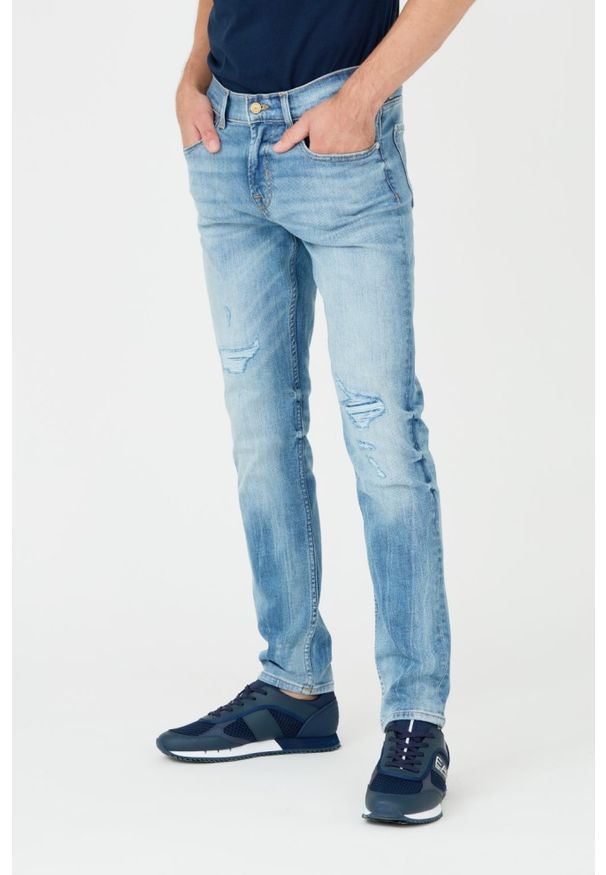 7 FOR ALL MANKIND Niebieskie jeansy Slimmy Tapered. Kolor: niebieski