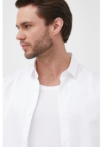 Armani Exchange koszula bawełniana męska kolor biały regular z kołnierzykiem klasycznym. Typ kołnierza: kołnierzyk klasyczny. Kolor: biały. Materiał: bawełna. Wzór: aplikacja. Styl: klasyczny #5