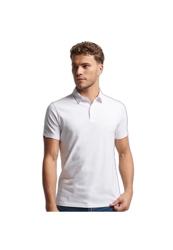 Koszulka polo z dżerseju Superdry Studios. Okazja: na co dzień. Typ kołnierza: polo. Kolor: biały. Materiał: jersey. Styl: casual