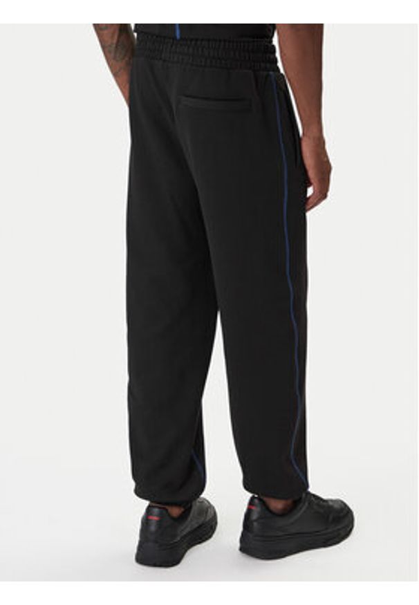 Hugo - HUGO Spodnie dresowe Notharos 50553508 Czarny Regular Fit. Kolor: czarny. Materiał: bawełna
