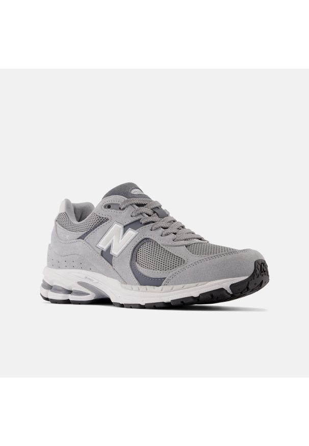 Sneakersy unisex New Balance M2002RST Szary. Kolor: szary. Materiał: guma, syntetyk, skóra, materiał. Szerokość cholewki: normalna. Sport: turystyka piesza