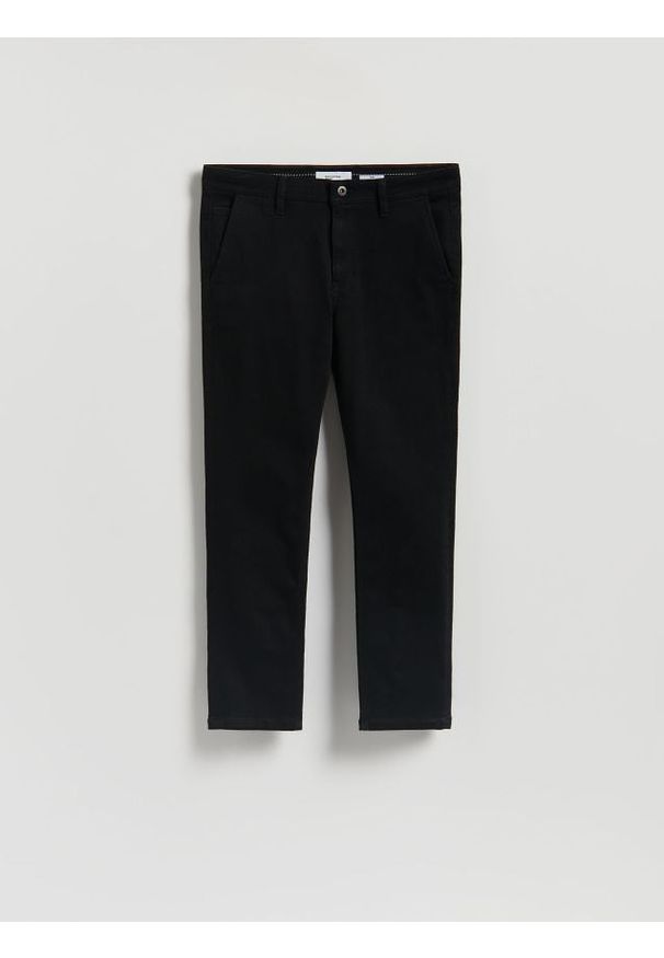 Reserved - Jeansy chino slim fit - czarny. Kolor: czarny