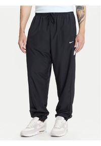 Nike Spodnie dresowe Icon FZ0250 Czarny Regular Fit. Kolor: czarny. Materiał: syntetyk