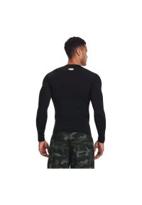 Koszulka męska treningowa Under Armour HeatGear Armour LongSleeve (1361524-001). Kolor: czarny. Materiał: elastan, tkanina, poliester, materiał. Długość rękawa: długi rękaw. Długość: długie. Sport: fitness