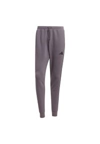 Adidas - Spodnie Essential 3-Stripes French Terry. Kolor: czarny, szary, wielokolorowy. Materiał: materiał