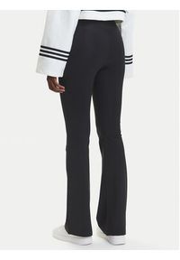 Adidas - adidas Legginsy Essentials Small Logo JD9961 Czarny Flared Fit. Kolor: czarny. Materiał: bawełna
