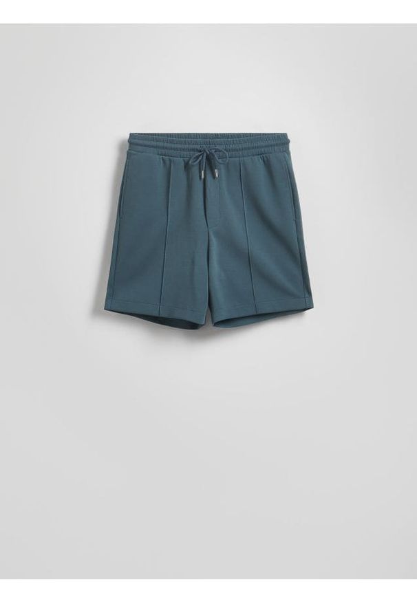 Reserved - Szorty comfort z przeszyciami - granatowy. Kolor: niebieski. Materiał: bawełna, dzianina