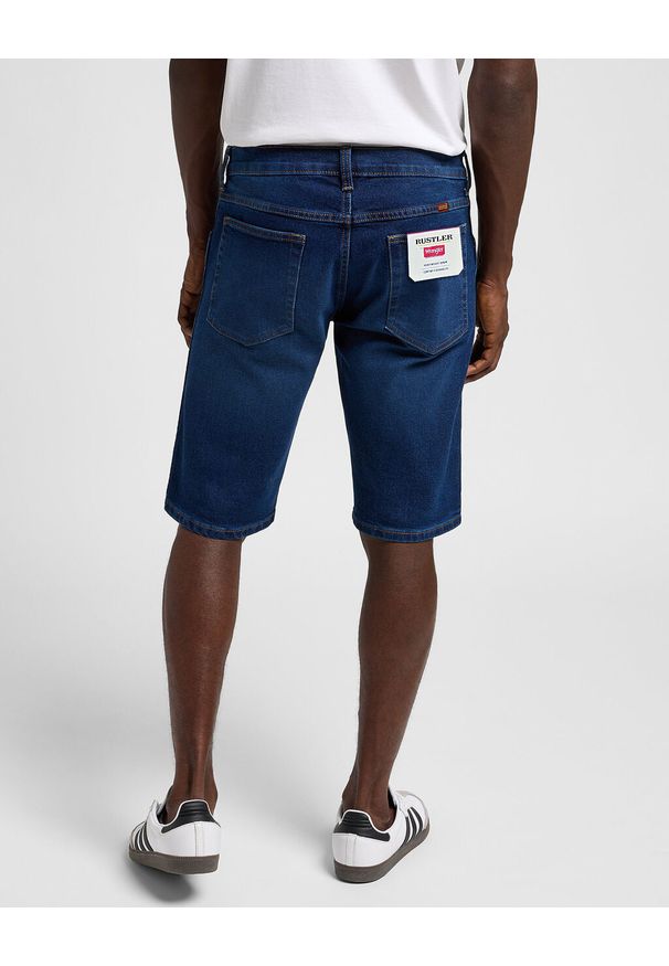 Wrangler - WRANGLER MĘSKIE SZORTY RUSTLER SHORT DARK WASH 112356515 W10H018377. Okazja: do pracy. Materiał: poliester, elastan, tkanina, bawełna, materiał, jeans. Długość: krótkie. Sezon: lato. Styl: klasyczny, wakacyjny, elegancki