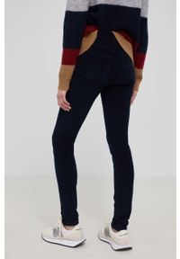 TOMMY HILFIGER - Tommy Hilfiger spodnie sztruksowe damskie kolor granatowy dopasowane medium waist. Kolor: niebieski. Materiał: sztruks #3