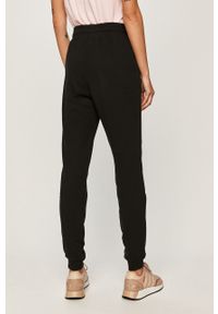 Armani Exchange - Spodnie. Kolor: czarny. Materiał: bawełna, materiał, dzianina, elastan. Wzór: nadruk #4