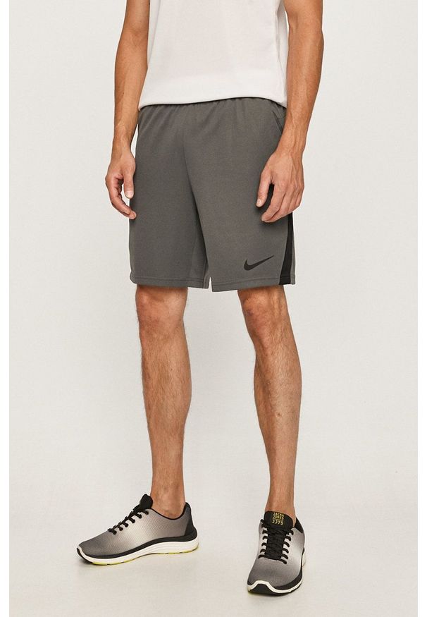 Nike - Szorty. Okazja: na co dzień. Kolor: szary. Materiał: tkanina, włókno, skóra. Styl: casual