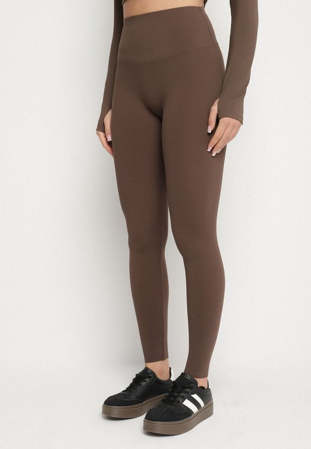 Born2be - Brązowe Legginsy z Wysokim Stanem i Przeszyciem Aletila. Okazja: na co dzień. Stan: podwyższony. Kolor: brązowy. Styl: casual