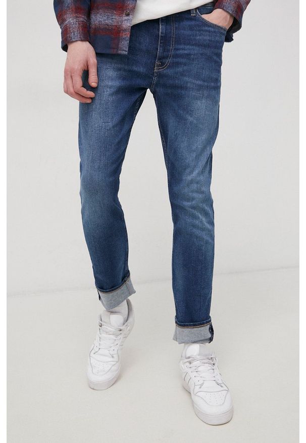 Tommy Jeans Jeansy SIMON CE131 męskie. Kolor: niebieski