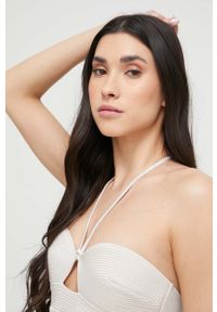 Calvin Klein jednoczęściowy strój kąpielowy kolor beżowy miękka miseczka. Kolor: beżowy. Materiał: materiał, dzianina, poliamid #3