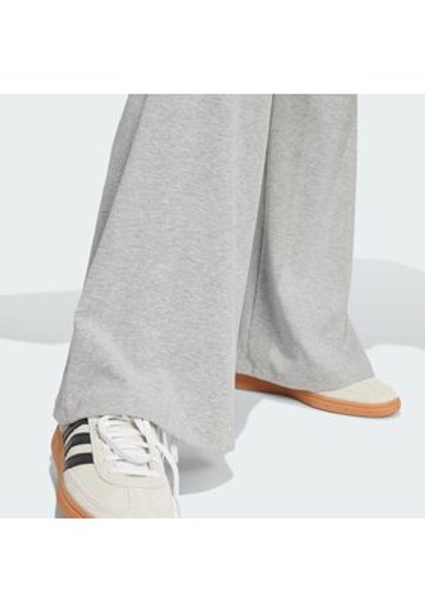 Adidas - adidas Legginsy Essentials IY9674 Szary Flared Leg. Kolor: szary. Materiał: bawełna