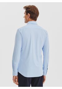 Pako Lorente - PAKO LORENTE – Niebieska dzianinowa koszula męska. Typ kołnierza: kołnierzyk klasyczny. Kolor: niebieski, biały, czarny. Materiał: dzianina. Długość rękawa: długi rękaw. Długość: długie. Wzór: gładki. Styl: klasyczny #3