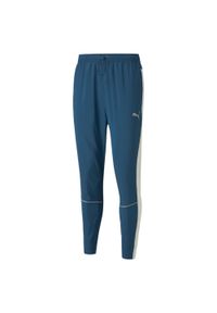 Puma Spodnie Run Tapered 52085865. Kolor: niebieski. Materiał: dresówka #1