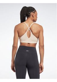 Reebok Biustonosz sportowy Lux Strappy Sports HT6148 Beżowy. Kolor: beżowy. Materiał: syntetyk