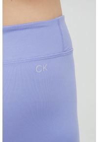 Calvin Klein Performance legginsy treningowe CK Essentials damskie kolor fioletowy z nadrukiem. Kolor: fioletowy. Materiał: skóra, dzianina. Wzór: nadruk