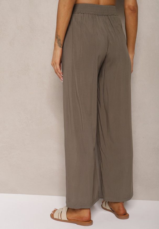 Renee - Ciemnozielone Bawełniane Szerokie Spodnie Kuloty High Waist z Gumką w Talii Evitaes. Okazja: na spotkanie biznesowe, na co dzień. Stan: podwyższony. Kolor: zielony. Materiał: bawełna. Styl: elegancki, biznesowy, casual